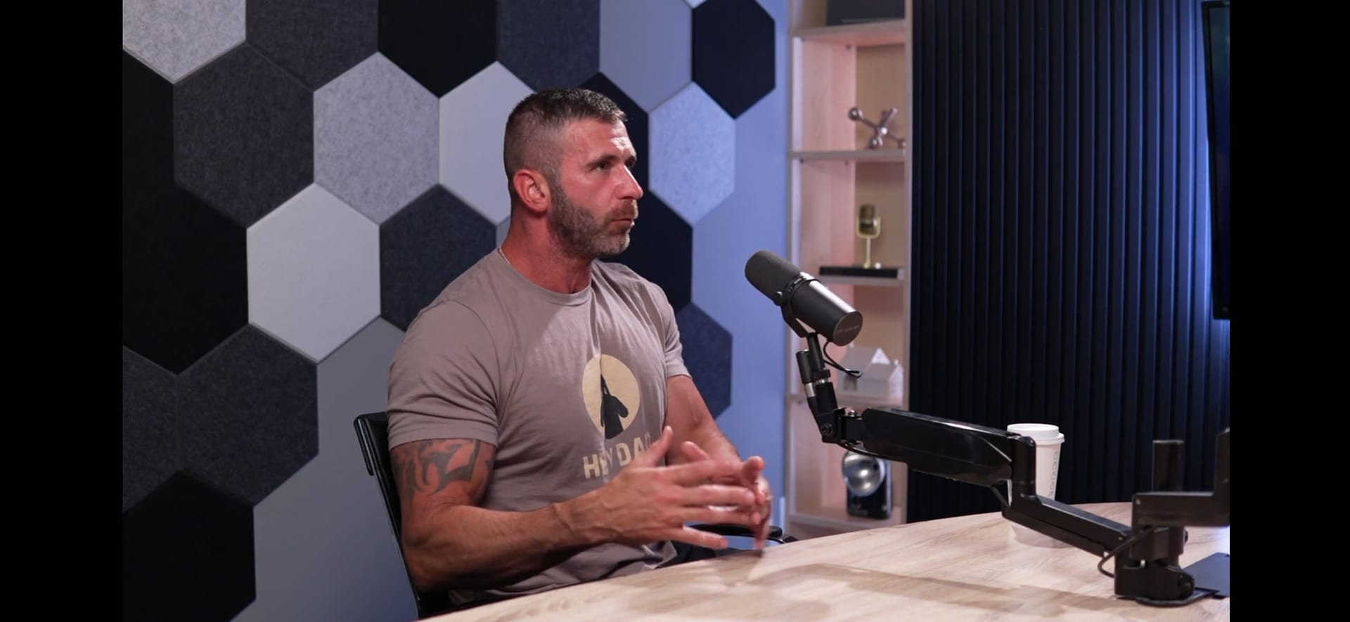 Justin recording the podcast